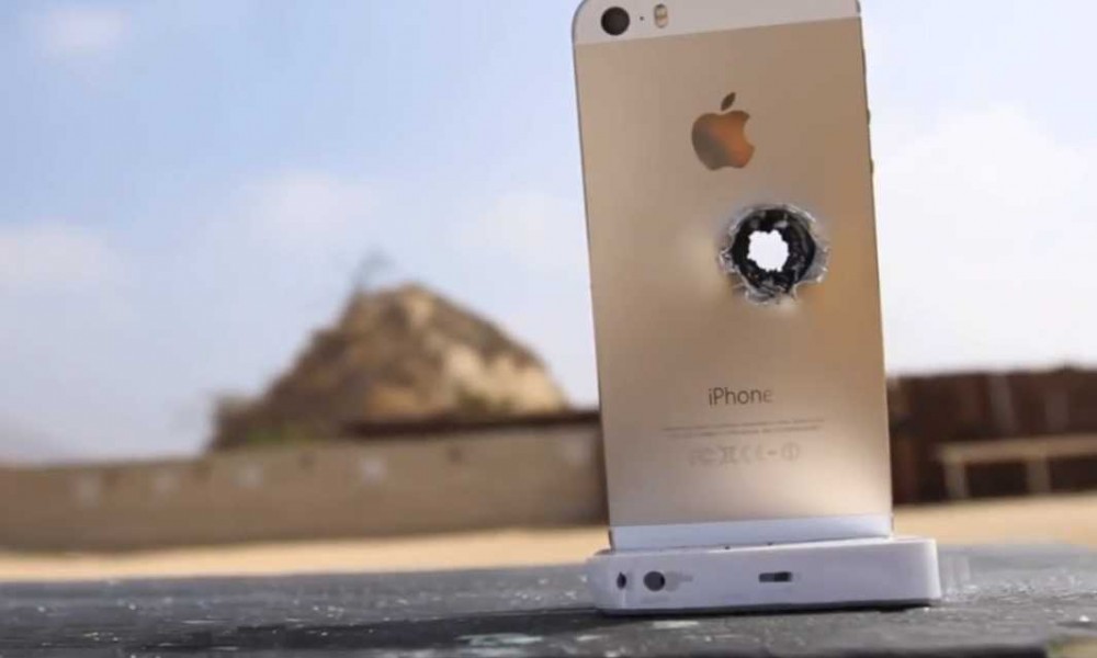 slow motion see what happens to a gold iphone 5s when you shoot it with a sniper rifle