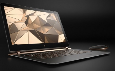 HP Spectre 13.3 right facing paired with wireless mouse 1024x575