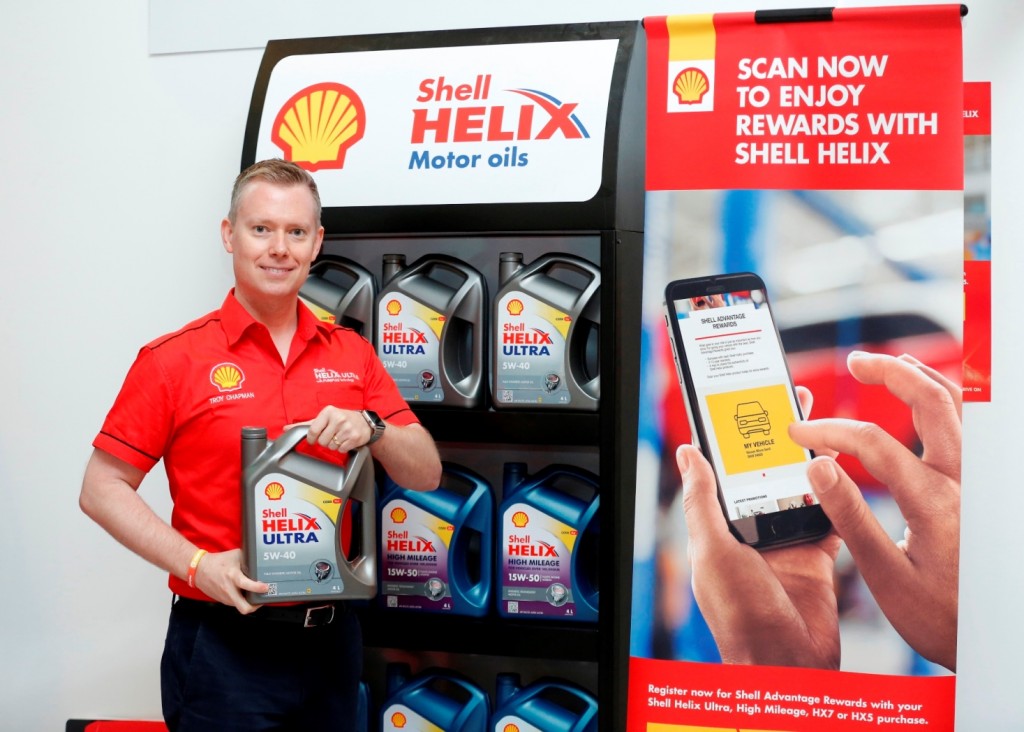 Shell Lubricants Exec Dir Troy Chapman with the new Shell Helix pack and SHARE