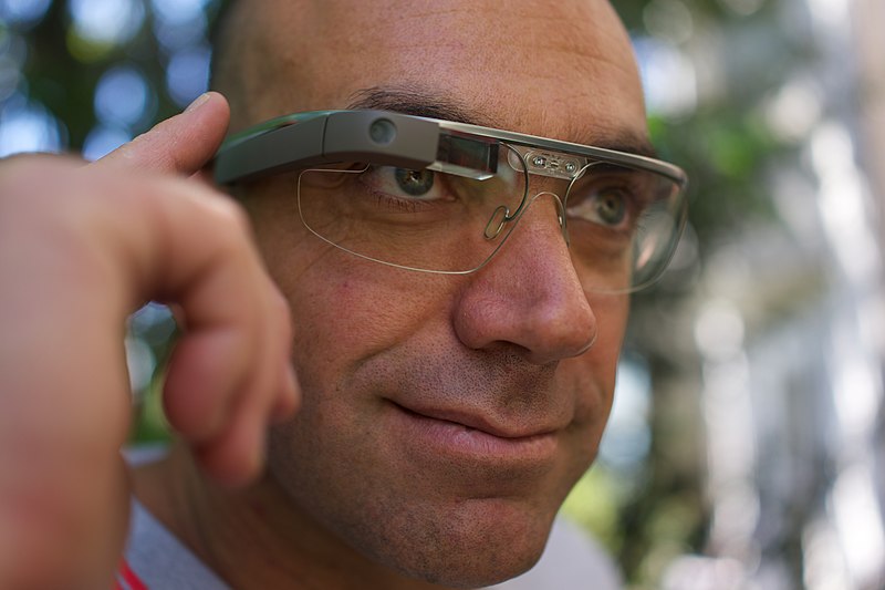 800px A Google Glass wearer