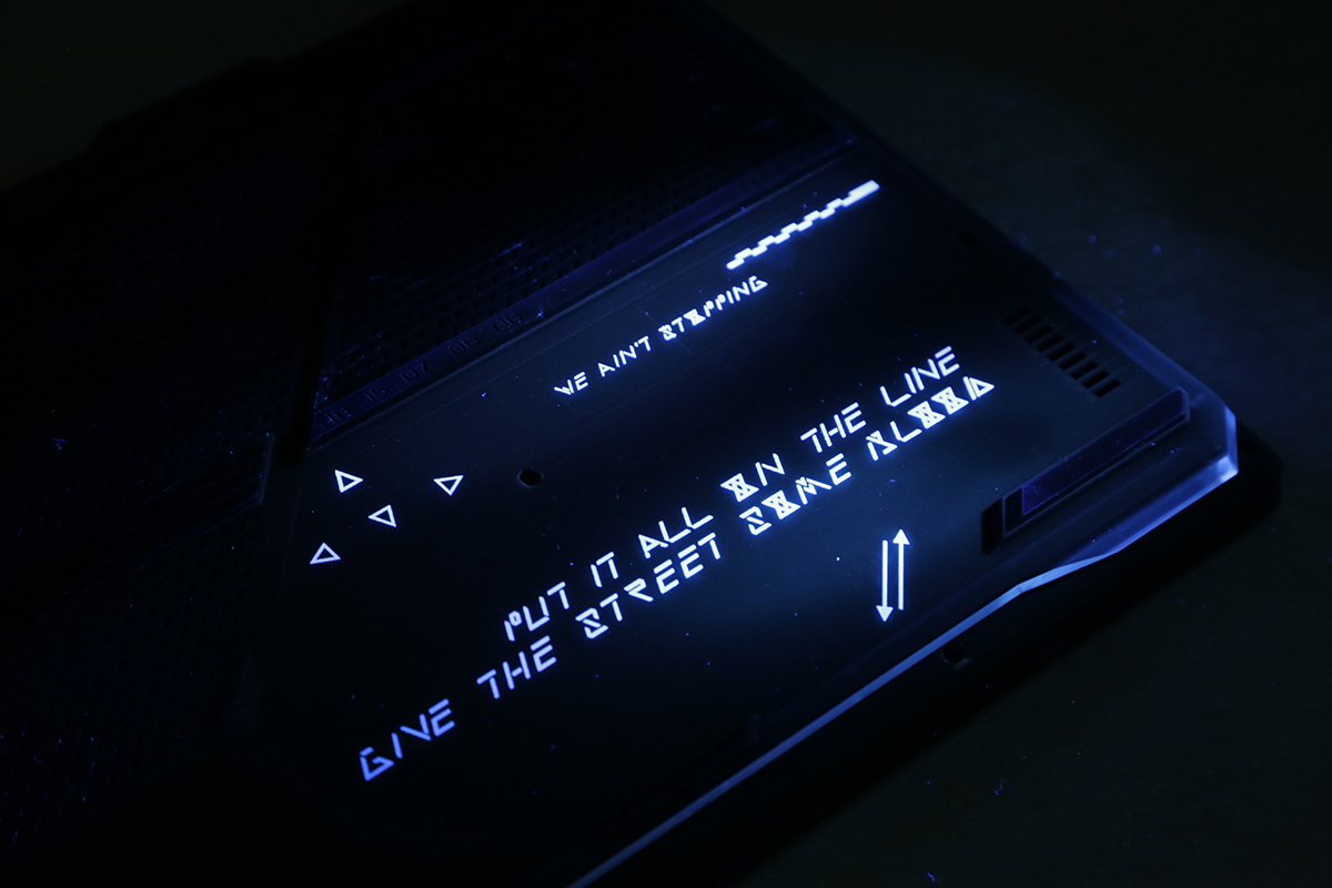Secret message in the laptop base under UV flashlight
